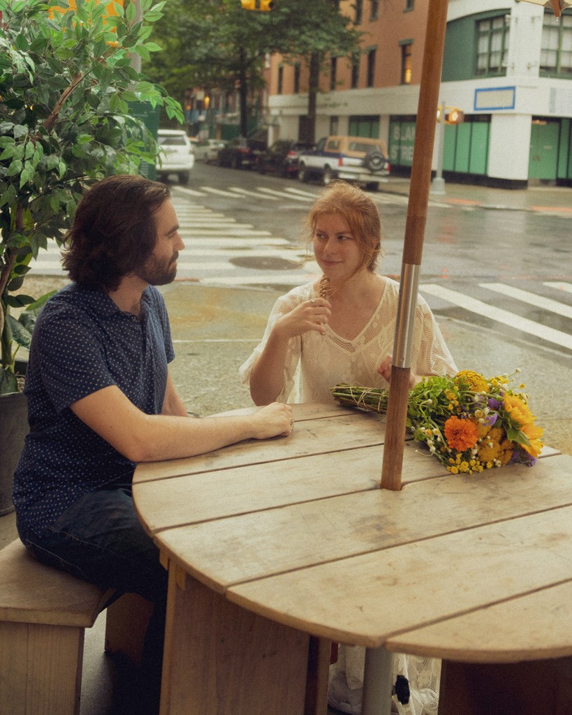 Romantic NYC couple photoshoot at a cozy Manhattan pizzeria with Lucy and Mark
